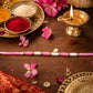 Cute Pink White Thread Rakhi for Brother with Golden Beads (1 Pc)