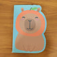School notebook with cartoon animal