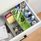 Clear plastic storage tray with dividers for organizing small craft items India