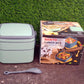 green lunch box with spoon 