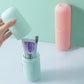 Capsule-shaped organizer for portable storage, available in multiple colors.