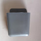 Multicolour remote storage organizer, wall mounted.