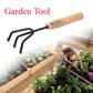 Black steel hand cultivator for gardening tasks.