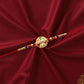 Designer Floral Rakhi With Mirror Work  Colorful Beads On Red Thread