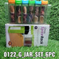 Assorted plastic spice jars with bright, colorful lids