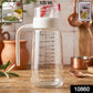 500ml Glass Oil Dispenser Bottle with Auto-Flip Cap, Measurement Markings and Usage Inset Images Showing Oil Pouring on Salad
