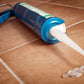 Versatile steel caulking gun for effective silicone application.