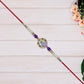 Elegant Ganesh Rakhi With Pearl And Purple Beads