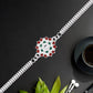 Traditional Floral Rakhi With Red  Green Stones  Silver Designer Rakhi For Brother